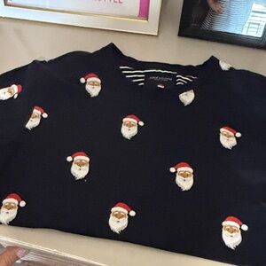 Black Santa tshirt size 13/14 running like a size 10-12
